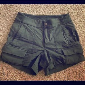 Athleta Green shorts with pockets and button